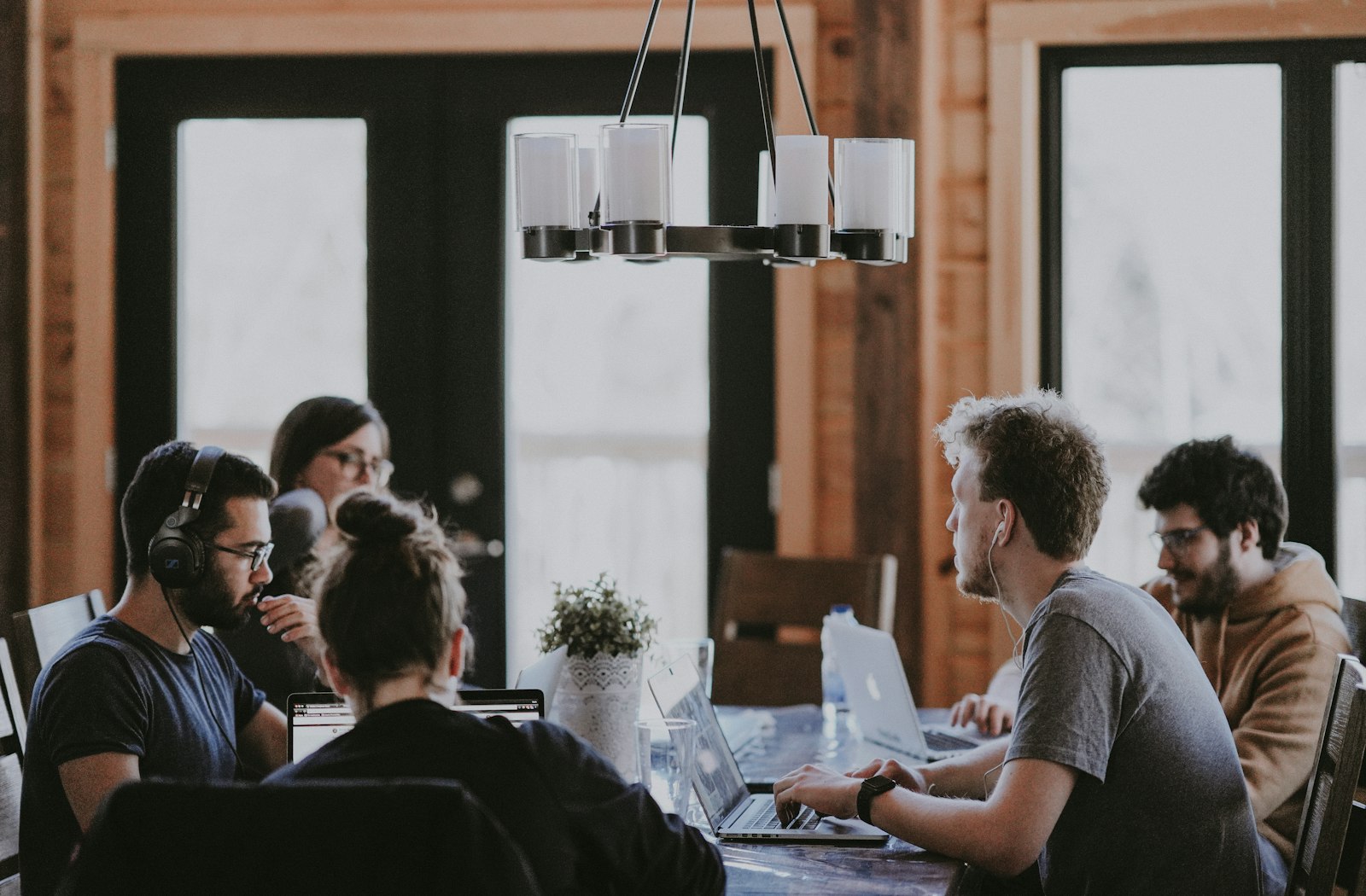 A collective working together at one table