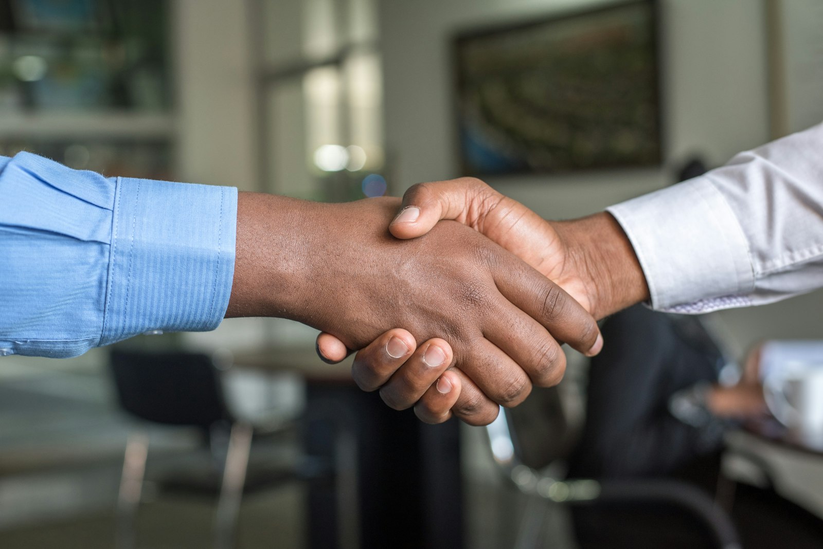 Two founders shaking hands to start a venture